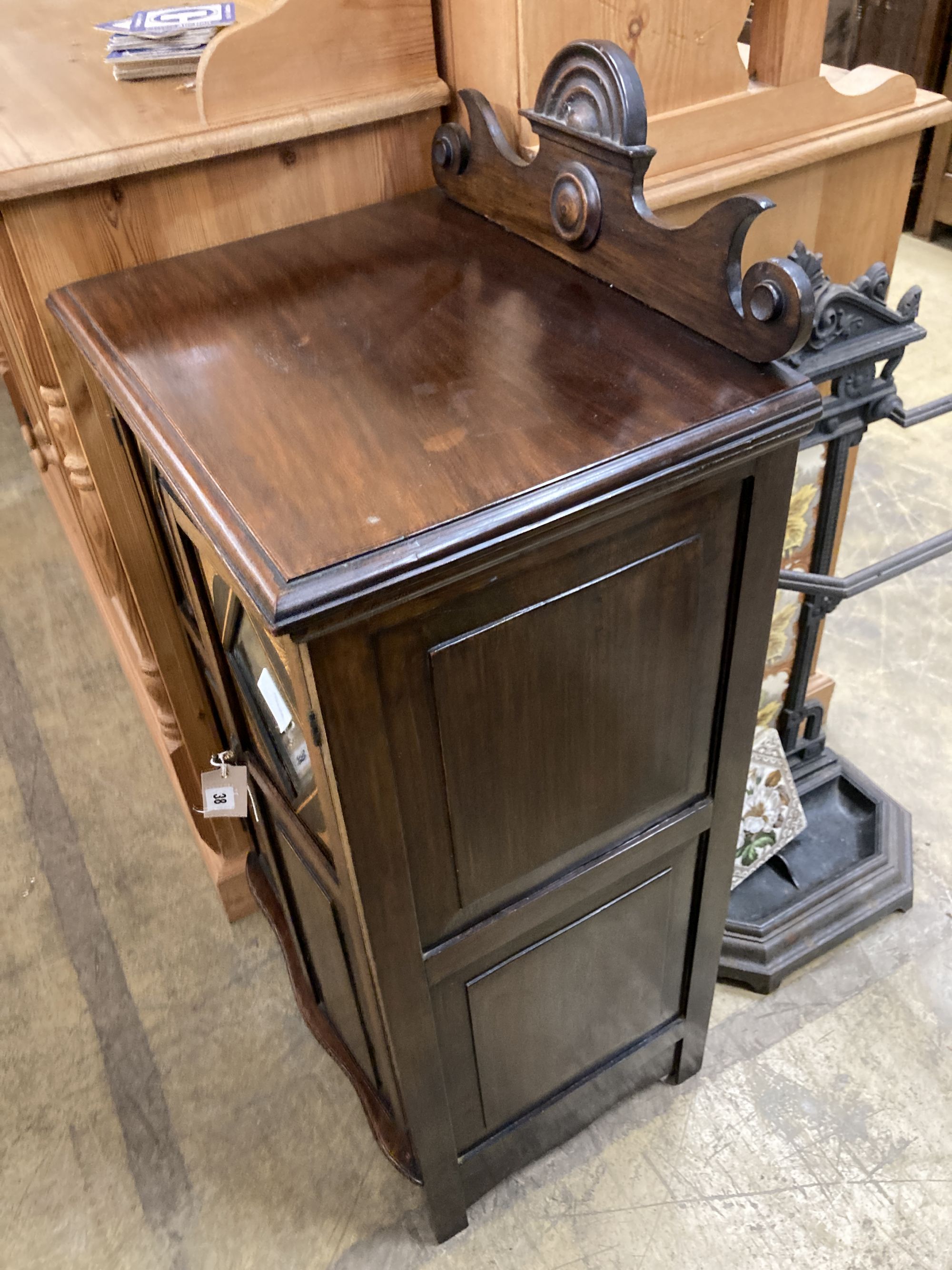 A Victorian inlaid mirrored music cabinet, width 48cm, depth 35cm, height 97cm